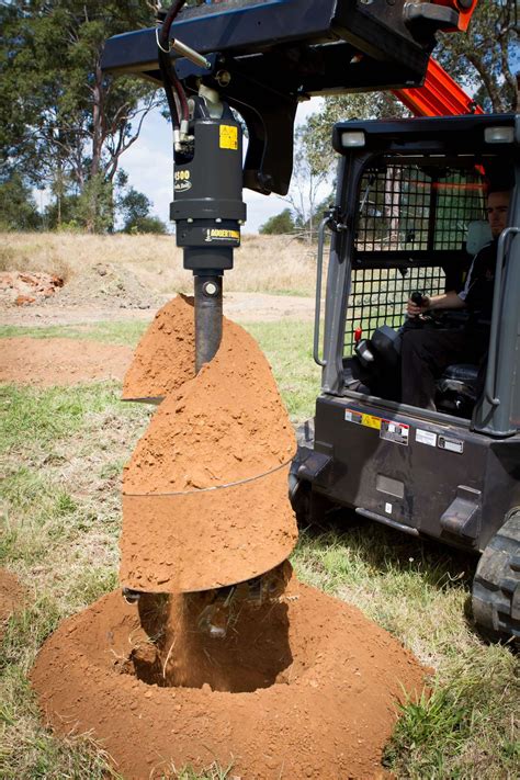 skid steer borehole drill rental 48462|skid steer auger rental.